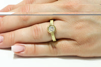Ring: 750er Gelbgold mit Brillant 0,58 ct.