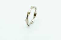 Ring: Welle Weißgold 585/... Brillanten