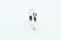 Ring: Silber 925/... Gold 750/... Topas