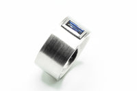 Ring aus 950 Platin mit einem Saphir Baguette