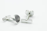 Manschettenknöpfe aus Tantal und Silber