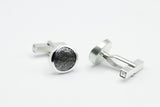 Manschettenknöpfe aus Tantal und Silber